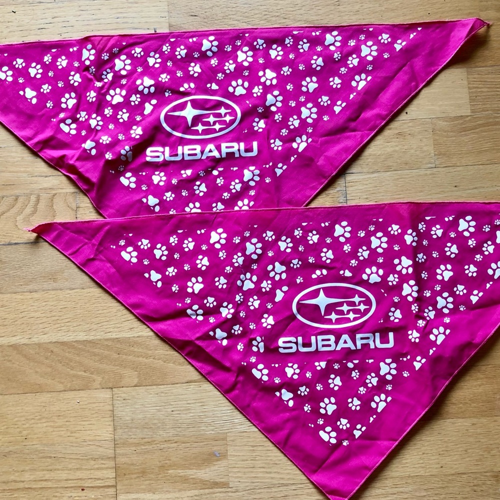 2 pink Subaru dog scarves. Sold as set, like-new.